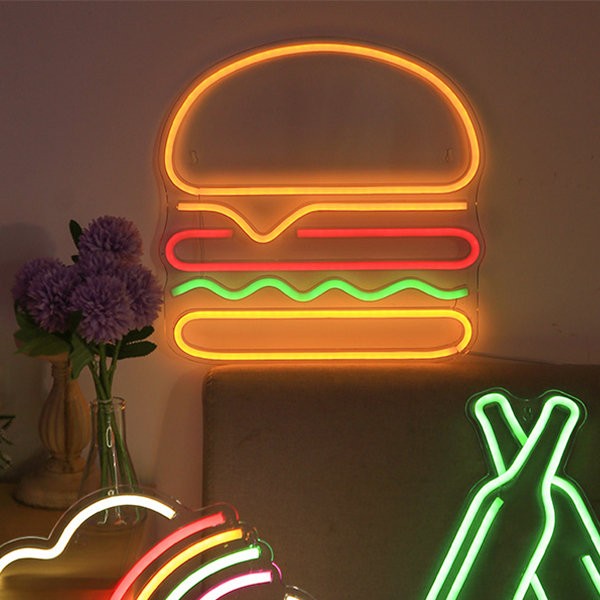 led svietiaci neon napis na stenu - hamburger